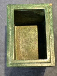 A rare large and inscribed archaistic bronze wine vessel, 'fang yi 方彝', Song/Ming