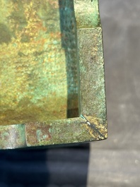 A rare large and inscribed archaistic bronze wine vessel, 'fang yi 方彝', Song/Ming