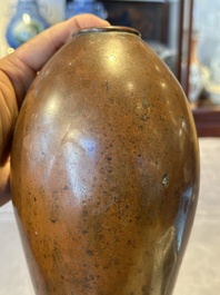 An unusual and large Chinese bronze vase, Ming