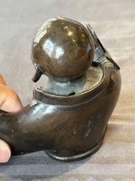 A Chinese bronze vase and a Taoist figure-shaped incense burner, Ming