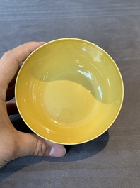 A pair of Chinese yellow-ground 'peach and bird' bowls, Qianlong mark and probably of the period
