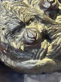 A Japanese bronze okimono with three monkeys, Yoshinobu seal mark, Meiji period