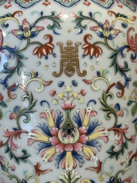 A pair of Chinese famille rose vases with floral design, Jiaqing mark, 19/20th C.