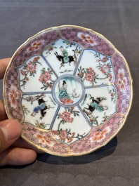 A Chinese famille rose cup and saucer with figures and animals, Yongzheng