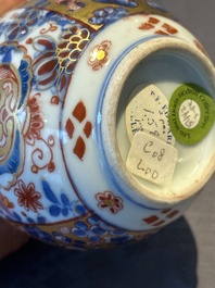 A Chinese English-decorated blue and white jug and cover, Kangxi