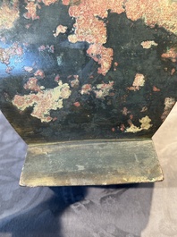 A Chinese archaic bronze vase with 'Taotie' handles, 'fang hu 方壺', Han