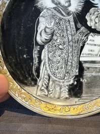 A rare Chinese grisaille and gilt cup and saucer with Ignatius of Loyola, Qianlong