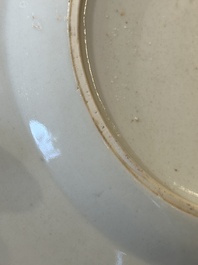 A Chinese rose-grisaille plate with Luohan, a dragon and a tiger, Yongzheng/Qianlong