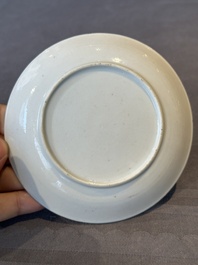 A Chinese famille rose cup and saucer with music making ladies, Yongzheng/Qianlong