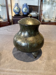 Two Chinese archaic bronze food vessels, 'ding 鼎', Han