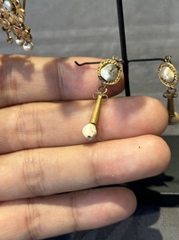 Three pairs of gold earrings with pearls and two gold pendants, Roman Era, 2nd/3rd C.