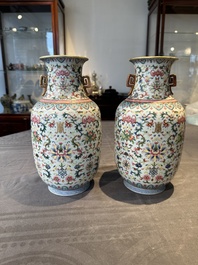 A pair of Chinese famille rose vases with floral design, Jiaqing mark, 19/20th C.