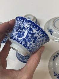 Five Chinese blue and white cups and four saucers with boys carrying a vase, Kangxi mark, Guangxu