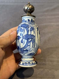 A Chinese blue and white 'hunting scene' 'klapmuts' bowl and a vase with a silver cover, Kangxi