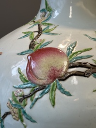 A Chinese famille rose relief-moulded 'tianqiuping' vase with nine peaches, Qianlong mark, 19/20th C.