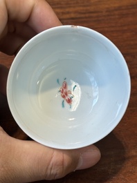Nine Chinese famille rose cups and eight saucers, Yongzheng/Qianlong