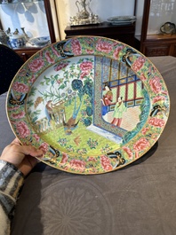 A Chinese Canton famille rose dish with a lady, servant and pheasants, 19th C.