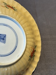 A pair of Chinese famille verte cafe-au-lait-ground cups and saucers, Kangxi