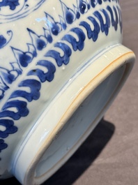 A Chinese blue and white 'lotus scroll' bottle vase, Transitional period