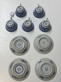 Five Chinese blue and white cups and four saucers with boys carrying a vase, Kangxi mark, Guangxu