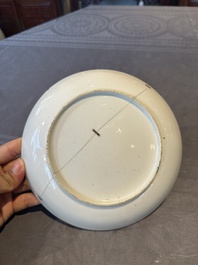 Two Chinese Canton famille rose 'mandarin subject' plates and a saucer, Qianlong