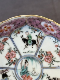 A Chinese famille rose cup and saucer with figures and animals, Yongzheng