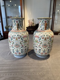 A pair of Chinese famille rose vases with floral design, Jiaqing mark, 19/20th C.