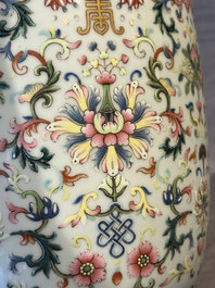 A pair of Chinese famille rose vases with floral design, Jiaqing mark, 19/20th C.