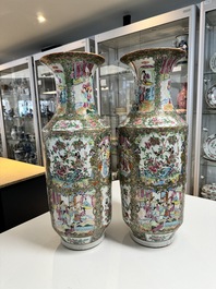 A pair of Chinese Canton famille rose vases with figures, flowers and insects, 19th C.