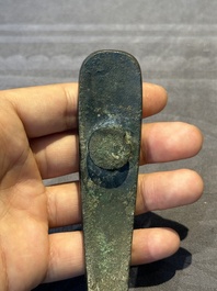 A varied collection of six Chinese bronze belt hooks, Warring States period and Western Han