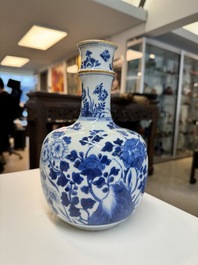 A Chinese blue and white bottle-shaped huqqa base with floral design for the Islamic market, Kangxi