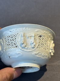 A pair of rare Chinese reticulated white-glazed biscuit 'Eight Immortals and Shoulao' bowls, Wanli