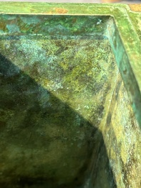 A rare large and inscribed archaistic bronze wine vessel, 'fang yi 方彝', Song/Ming