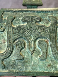 A rare large and inscribed archaistic bronze wine vessel, 'fang yi 方彝', Song/Ming