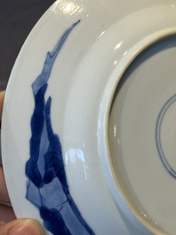 A pair of Chinese blue and white 'hunting scene' plates, Qi Yu Bao Ding Zhi Zhen 奇玉寶鼎之珍 mark, Kangxi