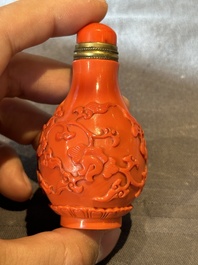Four Chinese Peking glass snuff bottles, one with a Qianlong mark, 18/19th C.