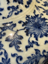 A Chinese blue and white 'lotus scroll' bottle vase, 18/19th C.