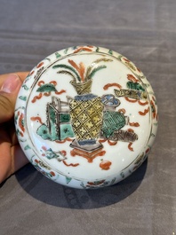 A Chinese famille verte 'figures and antiquities' jar and cover, Kangxi