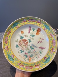A Chinese blue, white and famille rose tea service, three famille rose bowls, a plate and a covered jar, 19th C.