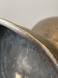 A pair of Chinese bronze 'hu' vases with Taotie design, Song/Yuan