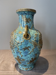 A pair of Chinese robin's egg and faux bronze-glazed 'hu' vases, Qianlong mark, 19th C.