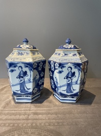A pair of Chinese blue and white hexagonal jars and covers with a lady holding a fan, 19th C.