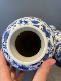 A Chinese blue and white garniture of five vases with lotus scrolls, 19th C.
