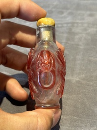 A group of six Chinese overlay glass snuff bottles, 19th C.