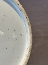 A Chinese blue and white 'flower scroll' jar with a wooden cover, Qianlong