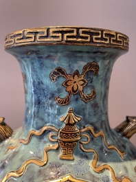 A pair of Chinese robin's egg and faux bronze-glazed 'hu' vases, Qianlong mark, 19th C.