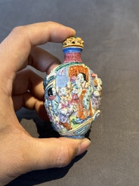 A Chinese famille rose moulded snuff bottle, Qianlong mark, late 18th/early 19th C.