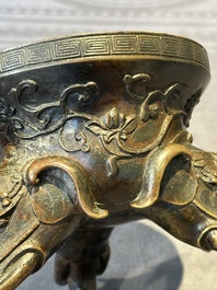 A fine Chinese tripod 'elephant' censer and cover, Ming