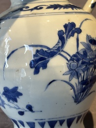 A Chinese blue and white vase with floral design and two handles, Transitional period