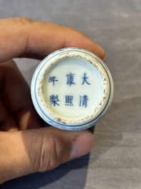 A Chinese blue, white and copper-red snuff bottle, Kangxi mark, 19th C.